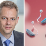 Thomas Olsgaard next to the GN Group ReSound Vivia hearing aids and the left hand corner of a mobile phone