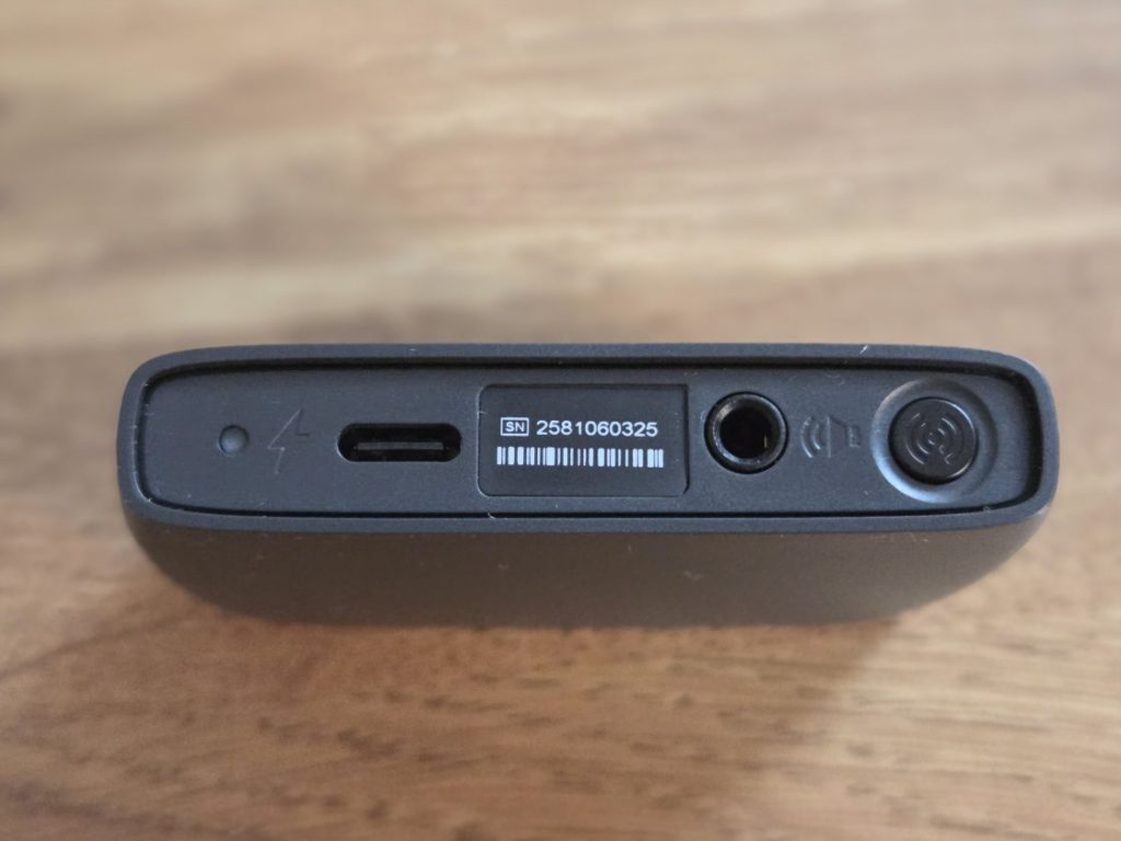GN ReSound TVStreamer+,rear view showing the USB-C port, the audio in port, and the setup button