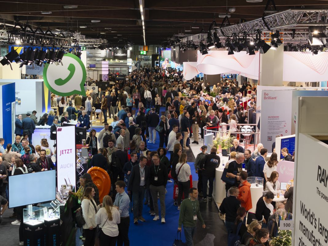 EUHA exhibition area with hundreds of people exploring stands