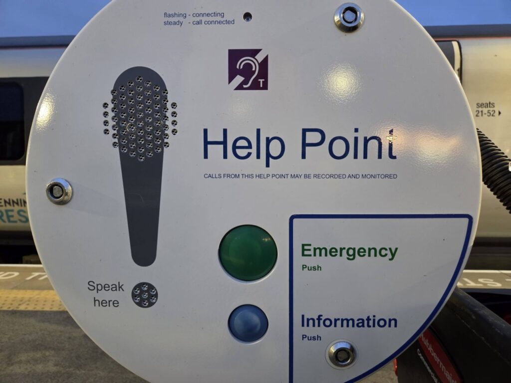 A help point on a railway platform, which has a built-in Telecoil