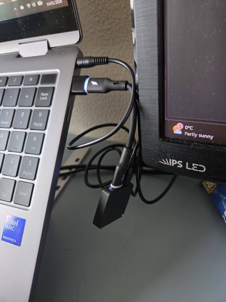 The FlooGoo FMA121 plugged into a laptop 