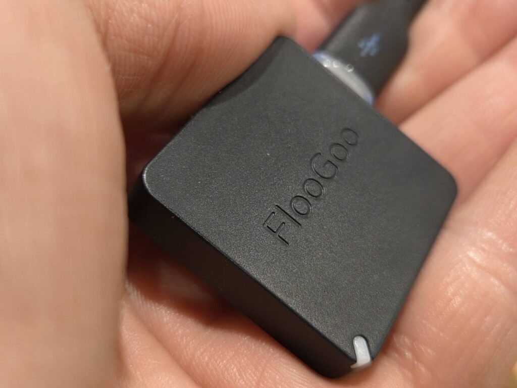 The FlooGoo FMA121 Auracaster is small enough to fit in the palm of your hand