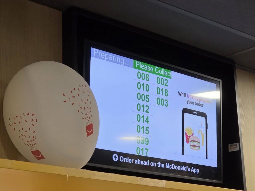 The order screen in McDonald's showing which orders are ready and which are being made