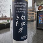 Assistive travel on the railways - a sign pointing out the help available