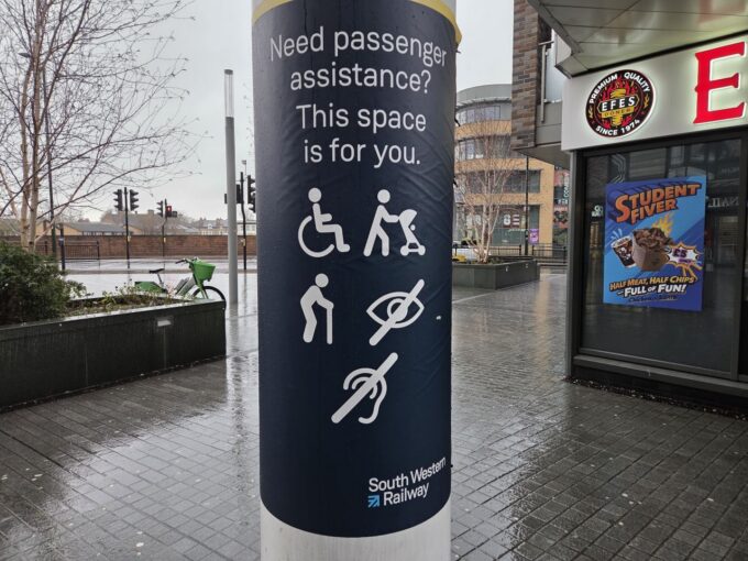 Assistive travel on the railways - a sign pointing out the help available