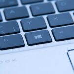 A closeup of a Windows 11 keyboard showing the Windows key