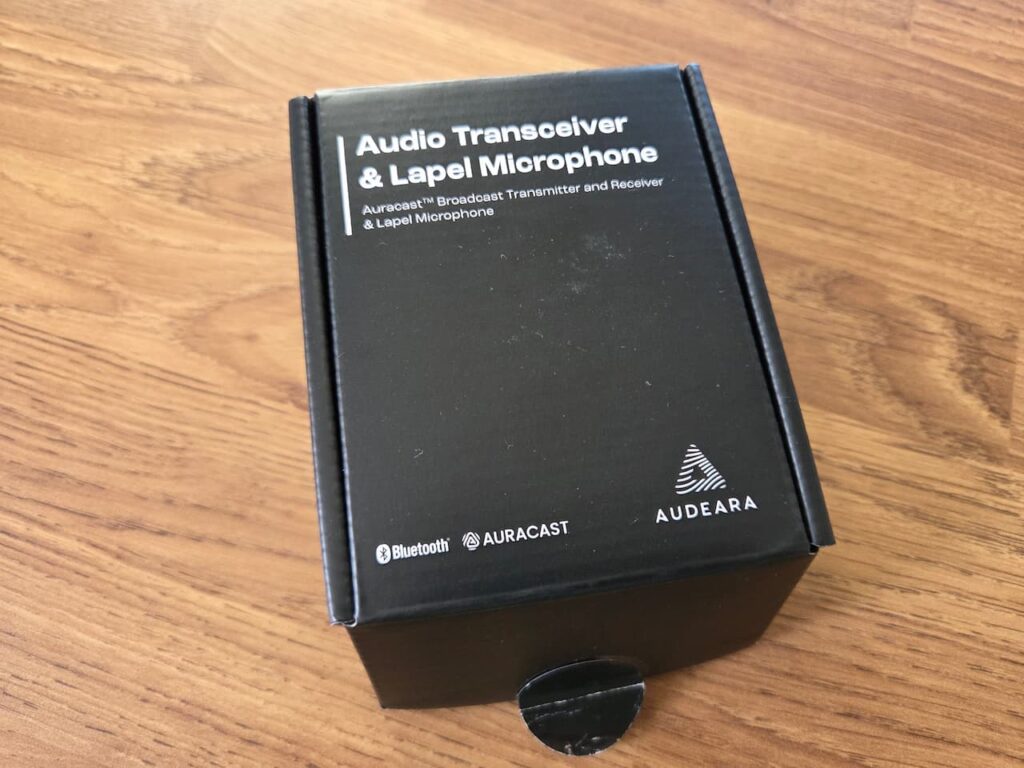 The The Audeara Audio Transceiver and Lapel Microphone box