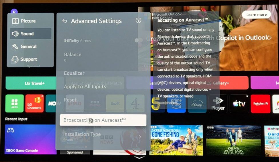 An LG television home screen showing the Advanced Settings menu overlay under the Sound category. The option Broadcasting on Auracast is highlighted at the bottom of the list. A descriptive text box on the right explains the feature, stating that the TV can start broadcasting only when connected to specific outputs like TV speakers, HDMI ARC, optical digital devices, or wired headphones.
