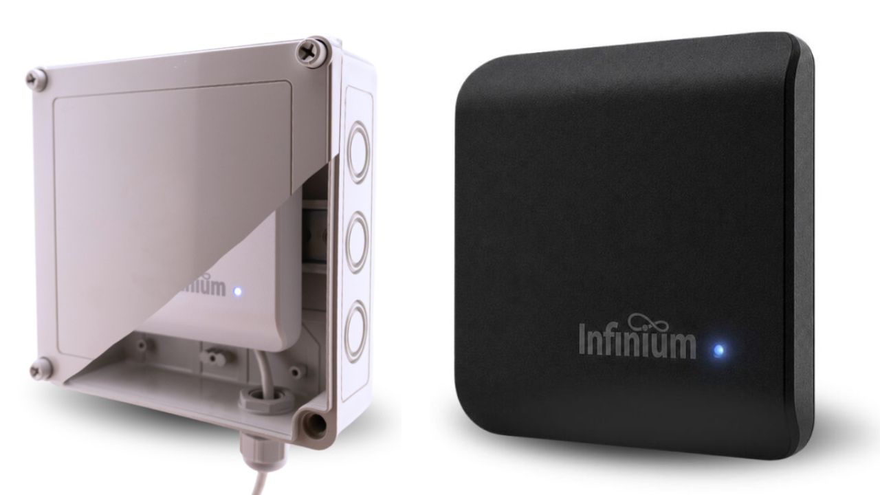 Two Williams AV hardware updates are shown side by side against a white background in Infinium update.jpg. On the left, a cutaway view shows an Infinium transmitter positioned inside a rugged, protective outdoor enclosure with a cable entry point at the bottom. On the right, a standalone square Infinium transmitter is presented in a matte black finish with a small blue status light glowing next to the logo.