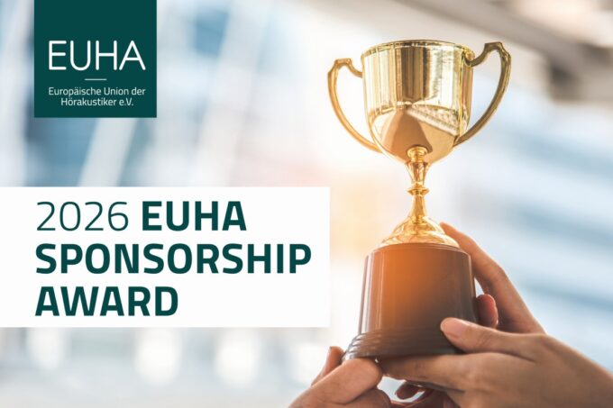 A promotional graphic featuring a golden trophy cup held up by two hands in the lower right corner against a blurred, bright architectural background. In the top left corner is a dark green square logo containing the white text EUHA and Europäische Union der Hörakustiker e.V. Below the logo, a large white text block features the dark green lettering 2026 EUHA Sponsorship Award.