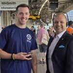 Two people standing next to each other at Bristol Temple Meads railway station